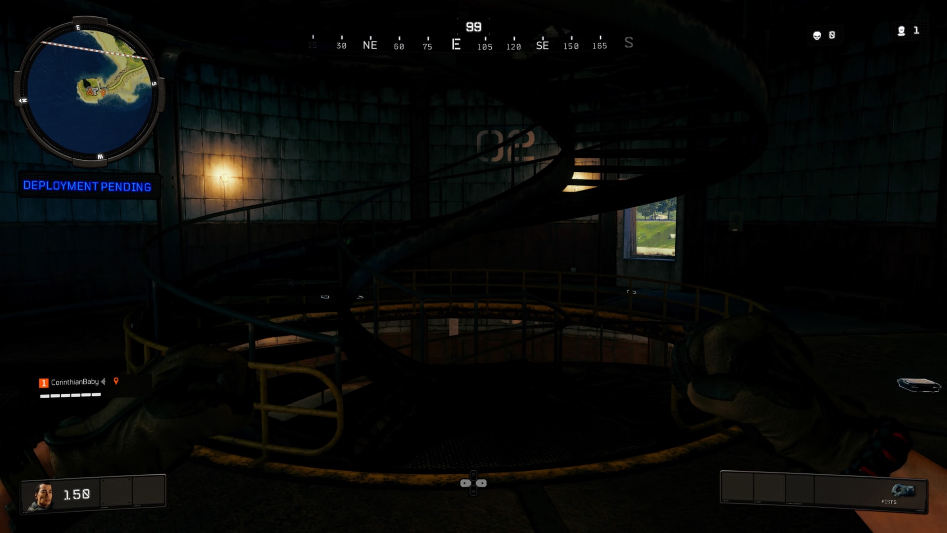 The spiral stair inside the lighthouse, lit by a single lamp